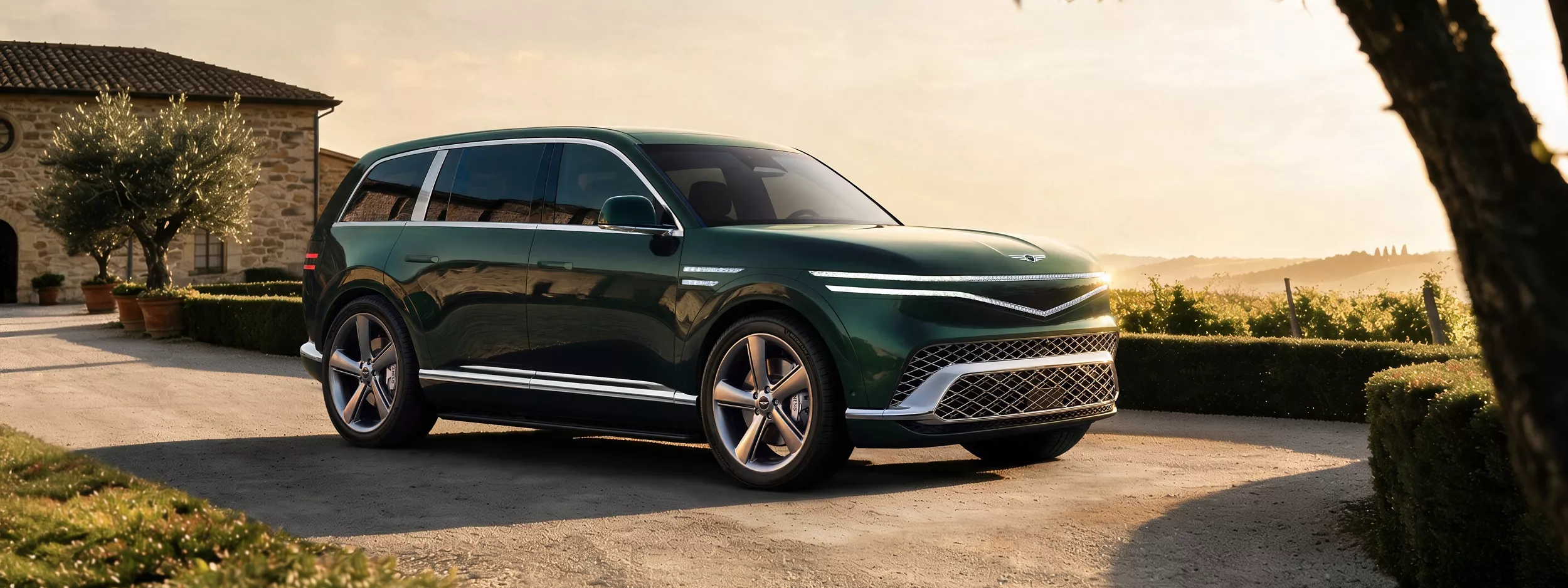 Forest green 2028 Genesis GV90 parked in a sunlit villa courtyard