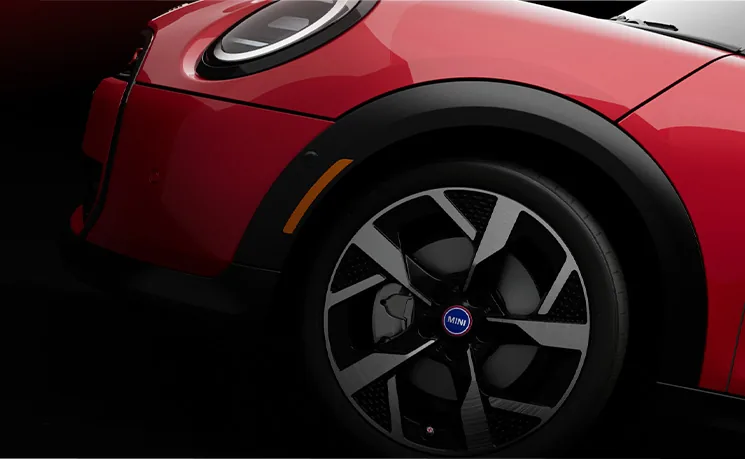 Close up of wheel caps and valve stem covers on Cooper Heritage Edition vehicle.