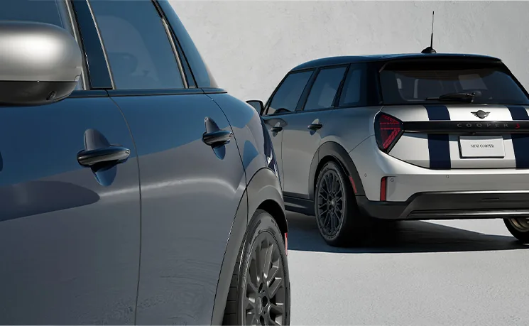 Close up view of Melting Silver III and Indigo Rooftop Edition vehicles.