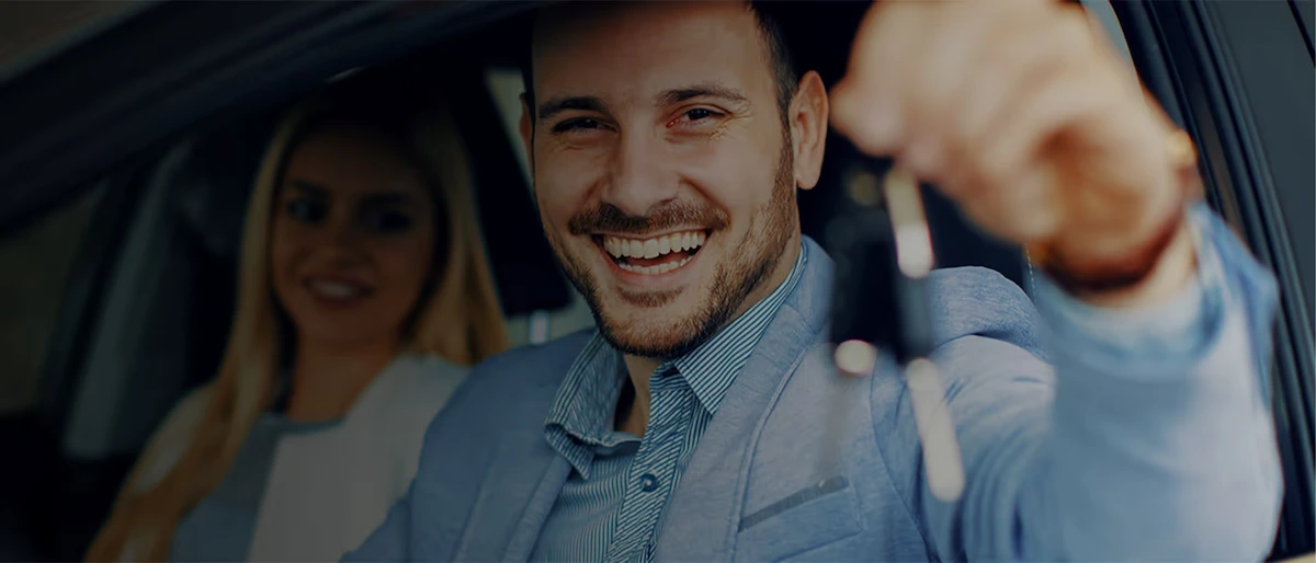 Happy customers with new car keys