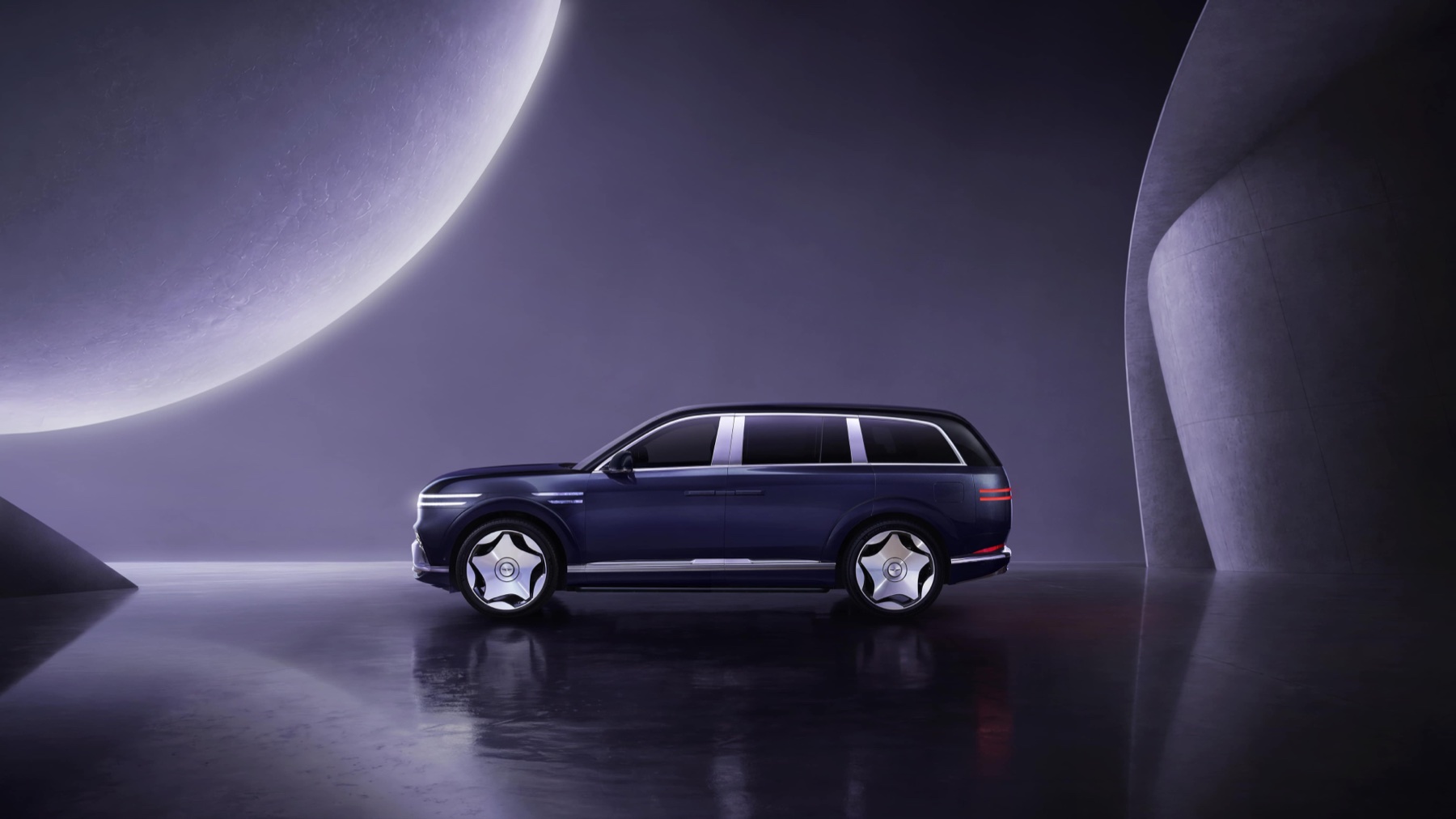 2028 Genesis GV90 Neolun First Edition in profile in a dark studio