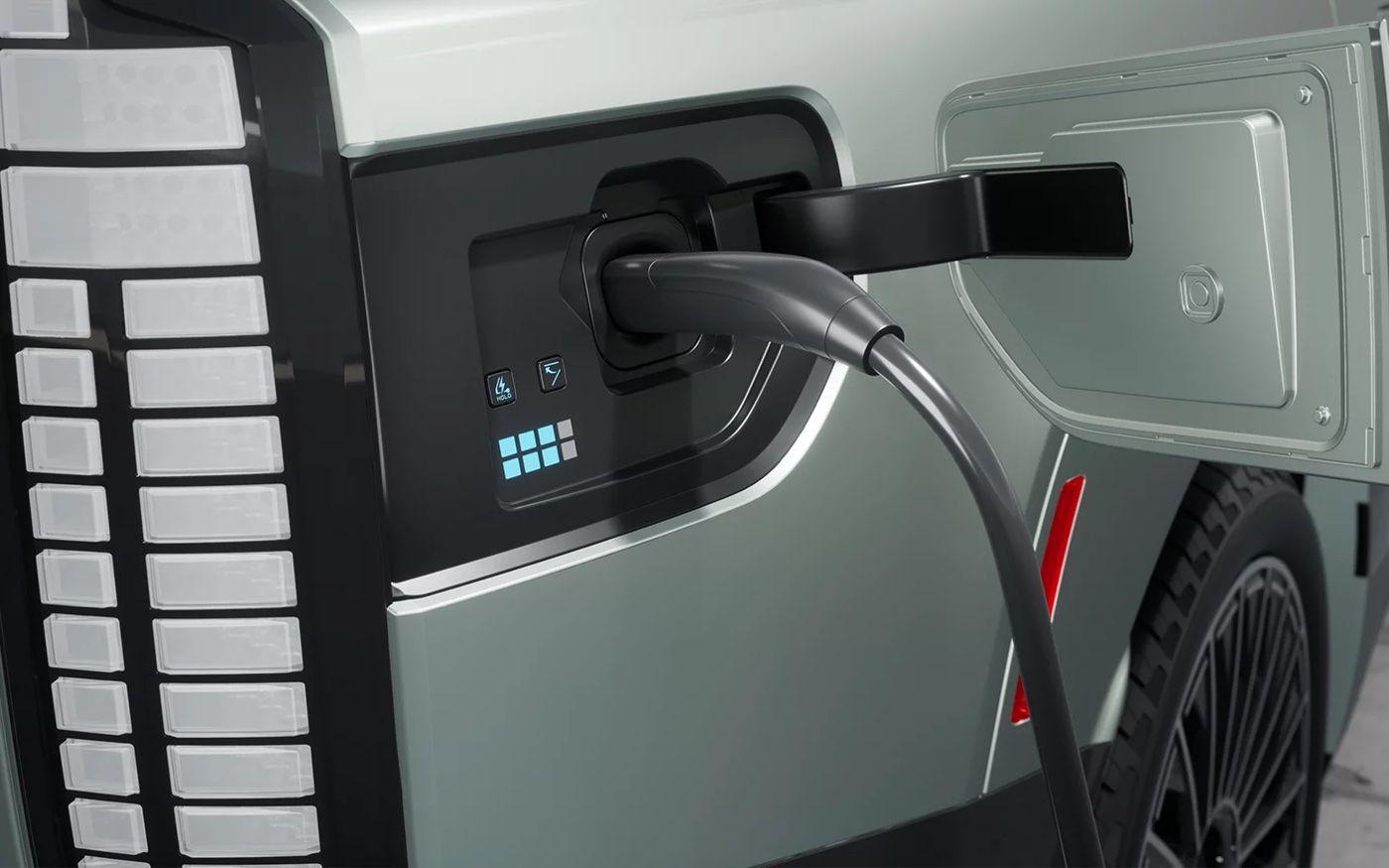 Charging handle plugged into a Hyundai EV port