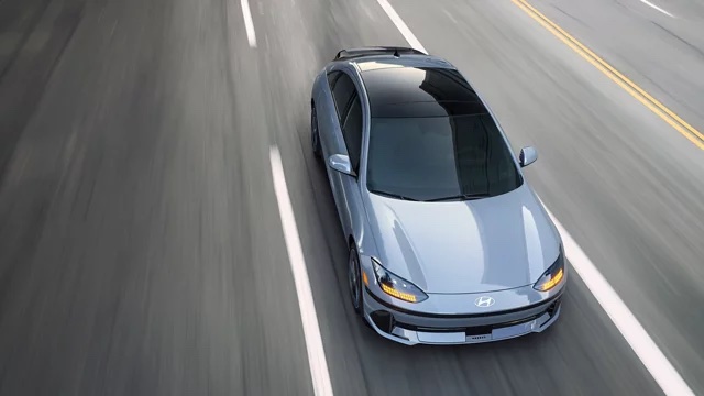 Hyundai electric vehicle at speed on the highway