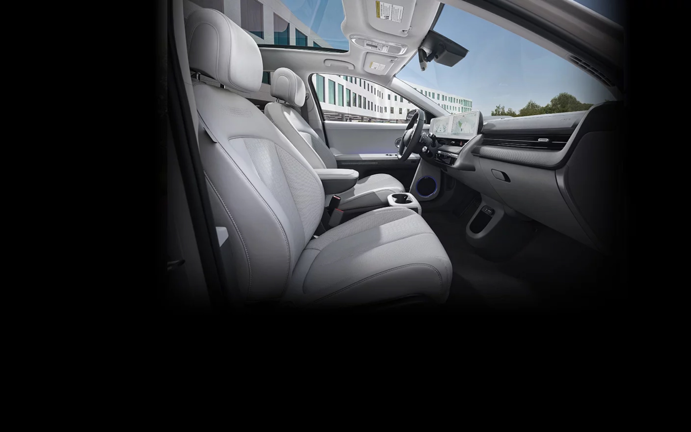 Interior of a Hyundai electric vehicle with a panoramic roof