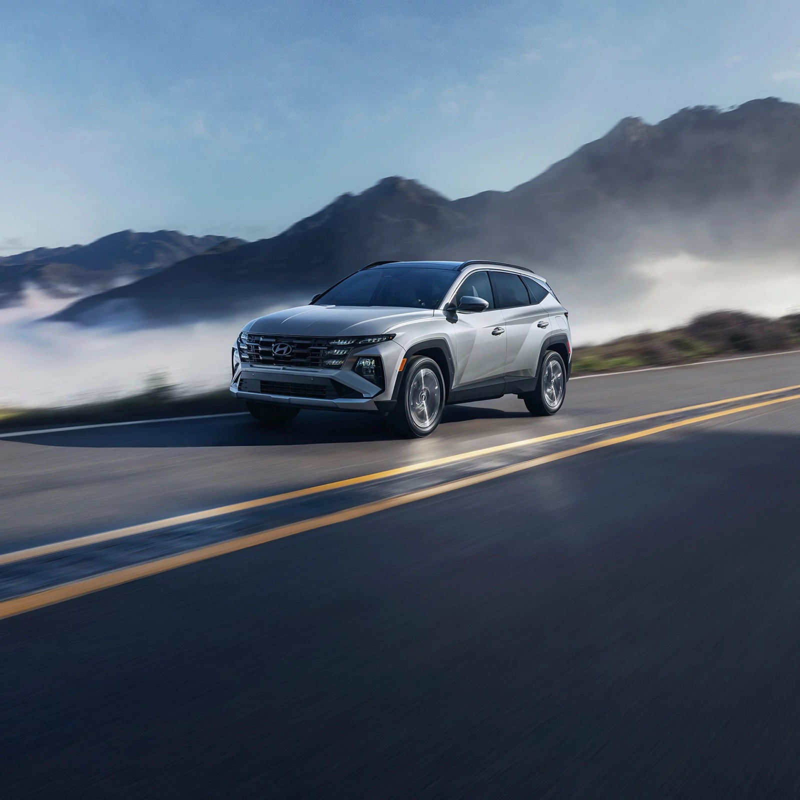 Hyundai TUCSON Plug-in Hybrid on a mountain road