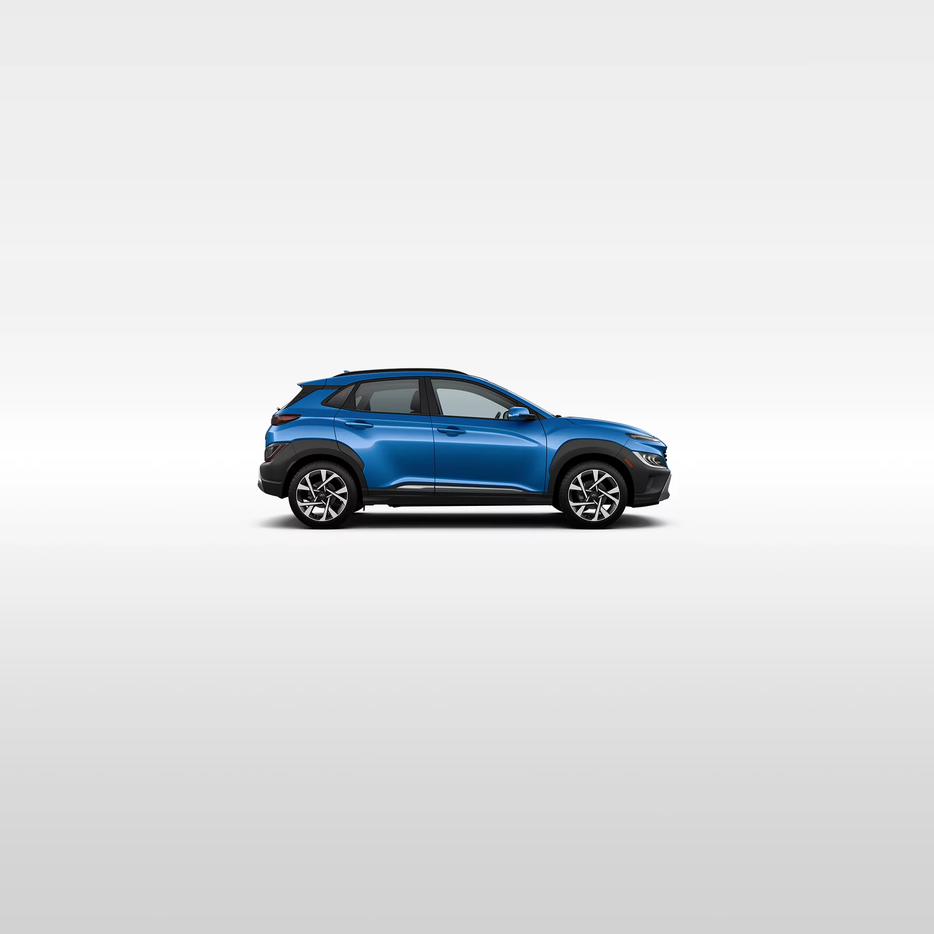 Blue Hyundai Kona studio photo, side view