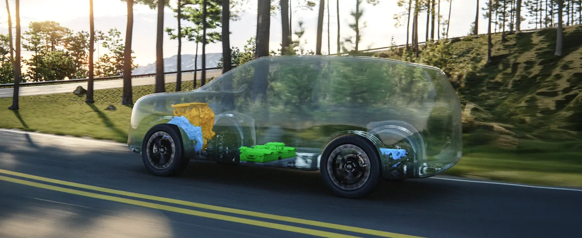 Cutaway view of the 2027 Nissan Rogue Hybrid e-POWER system on a winding forest road.