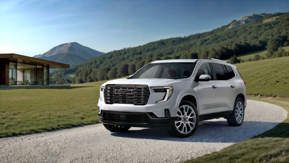 Front three-quarter view of a 2026 GMC Acadia Denali Ultimate in Glacier White Tricoat